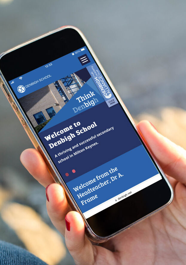 a school responsive website design shown on a smartphone