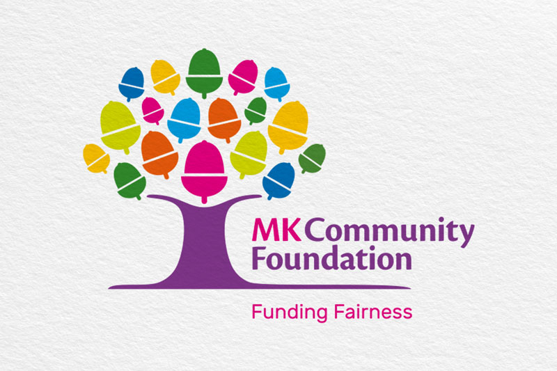 MKCF Full Colour Logo on white textured background